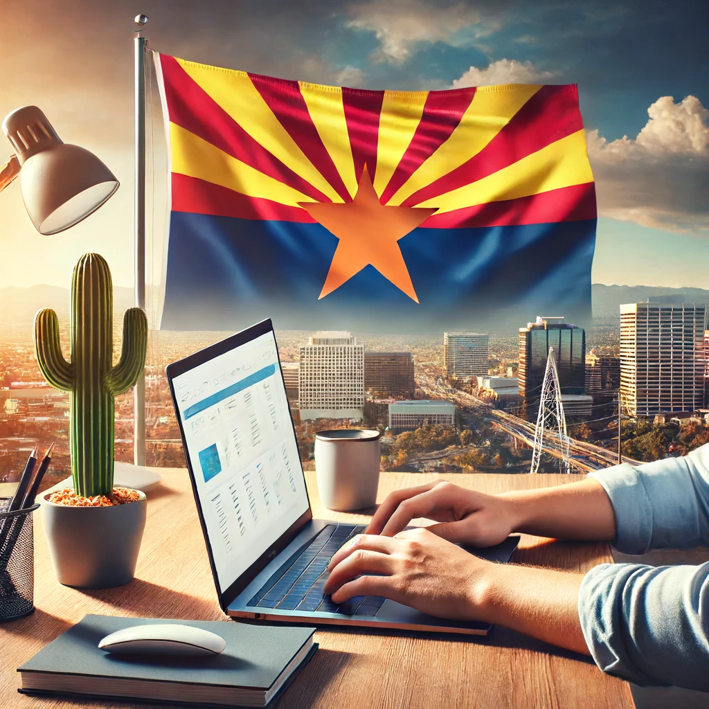 Person working at a modern office desk with a laptop, Arizona state flag, and a small cactus figurine on the desk, with Phoenix's skyline in the background.